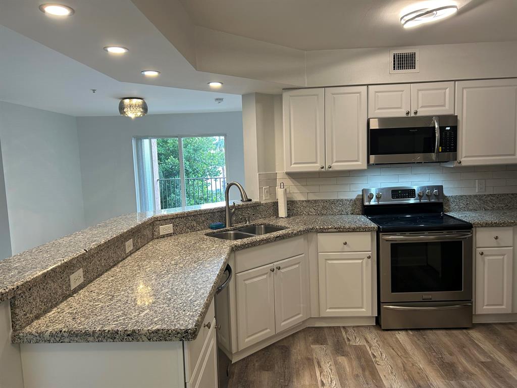 Schedule your showing to view this beautiful, modern and bright 3/2 located in the gated, intracoastal community of Mariner's Cay! This condo includes stainless steel appliances, granite countertops throughout, all brand new modern light fixtures and fans, new flooring, fresh paint, porcelain textured doors, keypad entry, and a one car garage with second parking spot! Amenities include Billiards, Business Center, Clubhouse, Community Room, Fitness Center, Library, Picnic Area, Play Area, Pool, Sauna, Spa-Hot Tub, and private beach!! Don't miss your opportunity to call this home!! Owner will consider annual furnished at $4,500!!