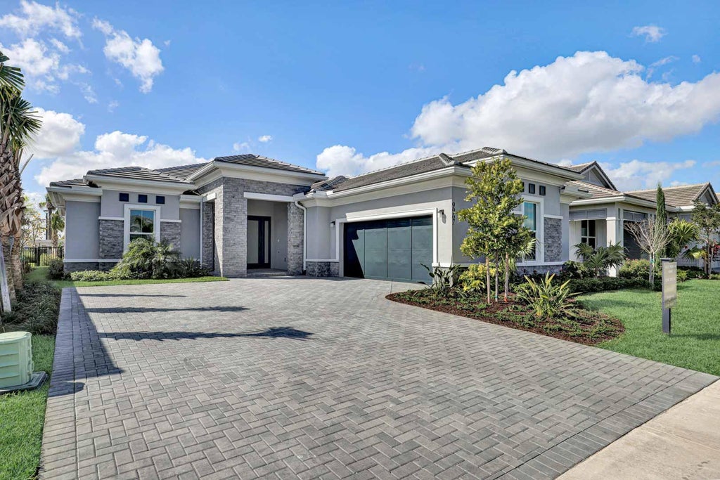 Photo of 9967 Seagrass Way, Palm Beach Gardens, FL 33412 (MLS # R11002843)