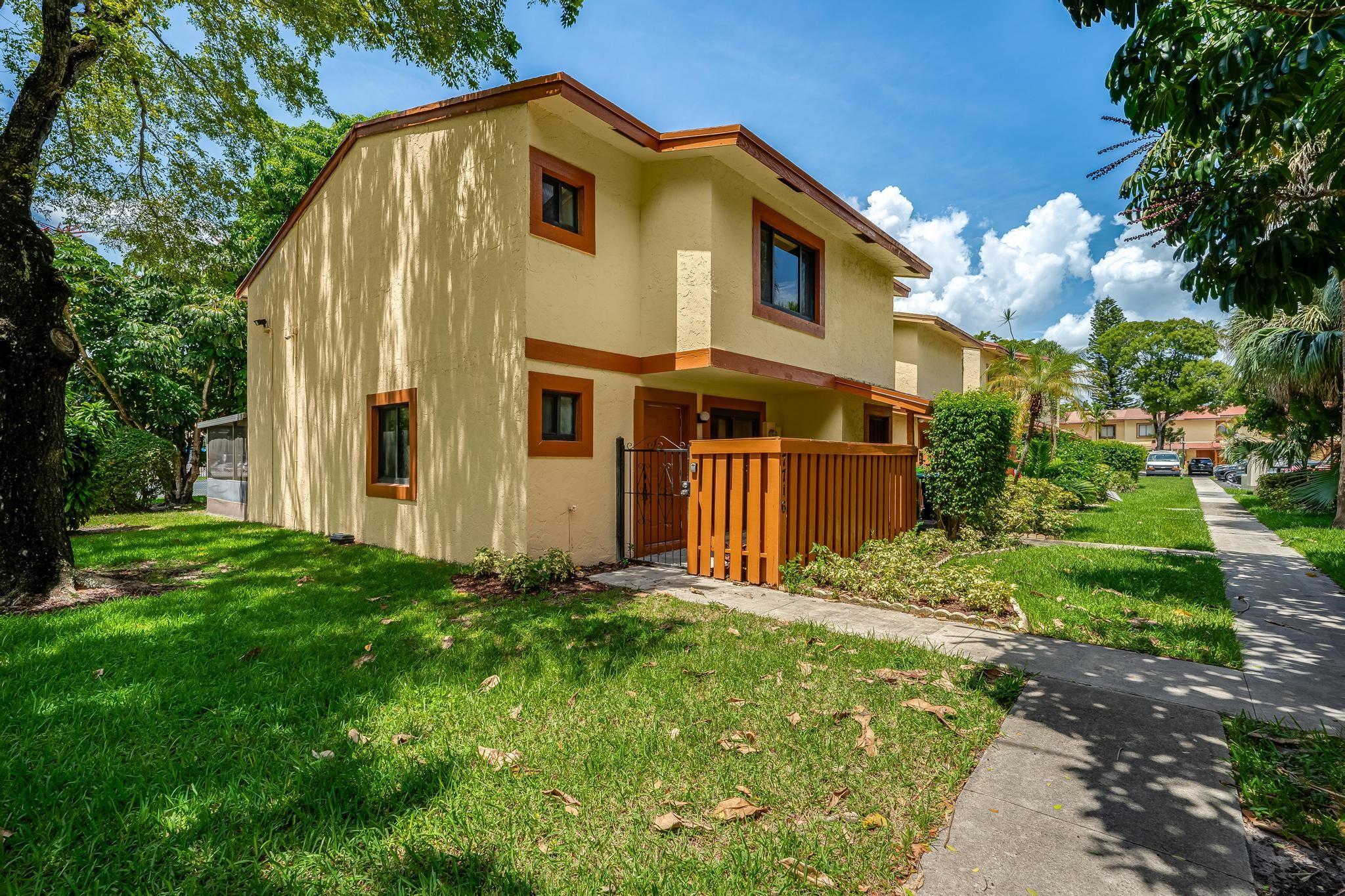 Nothing to do but bring your furniture! This home is fee simple, so you won't face the typical financing restrictions and headaches of condos. Low HOA fees that includes water give you peace of mind and affordability. This stunning 3-bed, 2.5 -bath townhouse has is turn key, offering modern finishes and a fresh, inviting feel. This home features all hurricane impact windows and doors. Step into a sleek, contemporary kitchen featuring modern cabinetry and quartz countertops. The bathrooms have been beautifully upgraded with luxurious 24"x48" tiles, new vanities, and LED mirrors, creating a spa-like atmosphere. Enjoy new vinyl flooring throughout for a clean and cohesive look, plus a spacious private screened patio perfect for entertaining or relaxing outdoors.