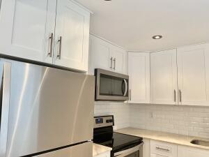 Great location! this remodeled unit is located in desireable Piedmont area. Redone kitchen & both bathrooms. Tile thru out. New walk-in showers in both baths. New kitchen, stainless steel appliances, new ceilings in baths & kitchen. Roll-ups on patio. Washer/dryer in closet on porch. Lift to 2nd floor in bldg. This is a resort style community with 2 golf courses-tennis courts, pickelball, Cafe & Bistro, 3 multi million dollar clubhouses, beautiful theatre with live entertainment,movies, clubs, dancing,library, art room, indoor lap & resistance pools. Courtesy bus to shopping daily. Just 6 miles from ocean and historic downtown Delray Beach.
