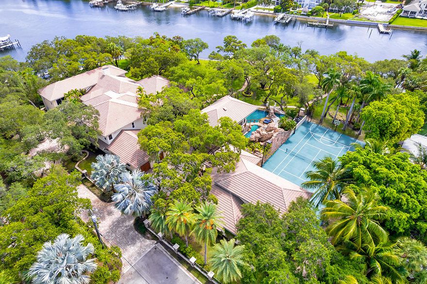 ''Oakwater Sanctuary'': Direct Intracoastal Estate on 3.52 Acres in Palm Beach Gardens
Once-in-a-generation opportunity to own one of Palm Beach County's largest direct Intracoastal estates. Situated on a double lot totaling approximately 3.52 acres, this gated offers 315 feet of direct Intracoastal frontage along a no-wake zone. Fee simple ownership. No HOA. Move-in Ready.
Extensively renovated in 2024-2025, this move-in ready estate includes total 7BR / 7BA in primary residence plus guest house, with total structures featuring 18,414 total square feet (15,000+ under air). Features include:

10,000+ sq. ft. main residence

Detached guest house and summer kitchen 10-vehicle motor court with A/C garages & potential expansion to 16 vehicles

75,000-gallon resort-style pool with spa, waterfall, grotto, swim-up bar, lap lane, and more

Home theater with 14-person seating

Private gym

Indoor squash/racquetball court

Regulation-size outdoor sport court (basketball/tennis)

3.52 acres with 100-year-old oak hammock and tropical gardens
BOATING FEATURES: Deep-water dock with 10 ft. depth at low tide Solid-concrete pilings No fixed bridges to the ocean Accommodates 100+ ft. yacht Additional 40,000-lb boat lift plus secondary lift for tender or jet skis
ENTERTAINING SPACE:
Rare Waterfront entertainment pavilion (grandfathered in under prior setback rules) Formal dining room Grand parlor Ample parking for up to 25 vehicles onsite, plus additional street parking Direct view of annual holiday boat parade
LOCATION: Located in central Palm Beach Gardens, just minutes from The Gardens Mall, shopping, dining, and top-rated schools. Direct east exposure with coastal breezes. Most destinations reachable without passing more than one stoplight.
INVESTMENT POTENTIAL: Although the home is move-in ready, the fee-simple ownership with no HOA restrictions allows for easy customization or redevelopment. Comparable projects nearby have demonstrated significant upside, with resales > $30M and current listings up to $47M. Double-wide lot property may also qualify for subdivision (buyer to verify).
Lot Details: Per plat and survey: 3.52 gross acres, extending from road to midpoint of Intracoastal Waterway. Current building footprint is 1.01. acres (FIND line setback). All measurements are approximate.
Showings by appointment only. All information deemed reliable but not guaranteed. Buyer to verify all measurements and development potential independently