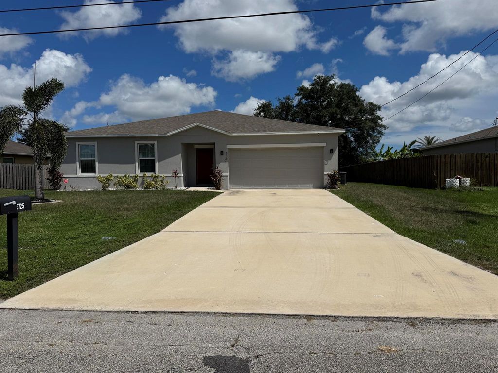 Photo of 3725 SW Kasin Street, Port Saint Lucie, FL 34953 (MLS # R11128138)