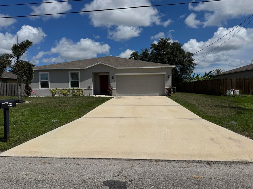 Great Location!!!   Open floor plan, 4 bedrooms, 2 baths (with double sinks), close to the Turnpike and I95 with granite kitchen counters, SS appliances, pantry, kitchen island counter w/seating, tile flooring throughout, and separate utility room, built in 2021. Interior ceiling fans and window treatments.  Storm panels thru-out.