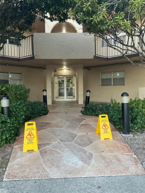 Photo of 6201 N FALLS CIR Drive #309, Lauderhill, FL 33319 (MLS # B26054003)