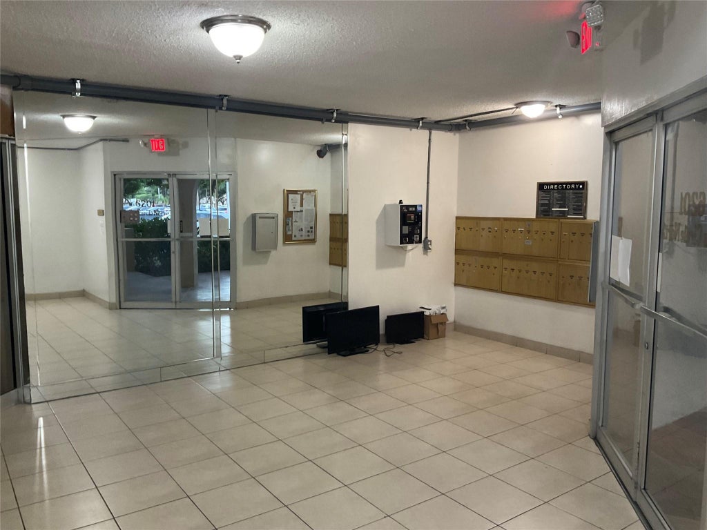 Photo of 6201 N FALLS CIR Drive #309, Lauderhill, FL 33319 (MLS # B26054003)