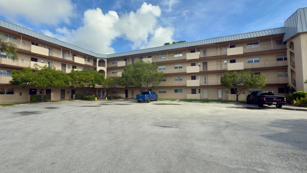 Photo of 6201 N Falls Cir Drive, Lauderhill, FL 33319 (MLS # B26009281)