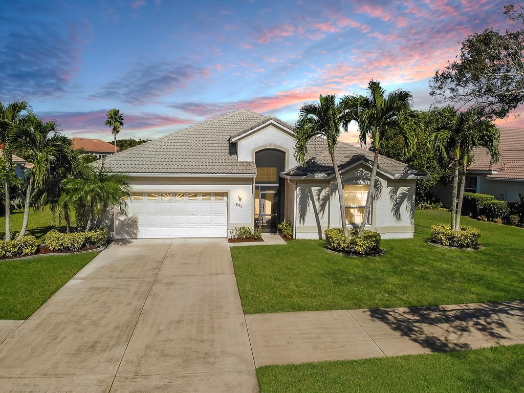 Photo of 891 SW Lake Charles Circle, Port Saint Lucie, FL 34986 (MLS # R10947198)