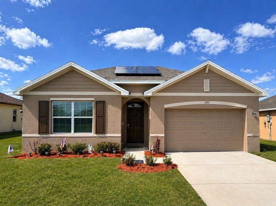 Welcome to this absolutely beautiful 2023-built home, offering the perfect blend of modern design and timeless charm. This spacious 4-bedroom, 2-bath residence features an open-concept layout ideal for both everyday living and entertaining. The heart of the home is a sleek, modern kitchen complete with a large island, pantry, coffee bar, and built-in Alexa system designed for convenience and style. The expansive owner's suite includes a custom closet, while the luxurious en-suite bath features dual sinks and a walk-in shower. Step outside and embrace the Florida lifestyle on your private back patio perfect for relaxing. Ideally located near major highways, shopping, dining, and top-rated schools, this home truly has it all. Be prepared to fall in love schedule your showing Today!