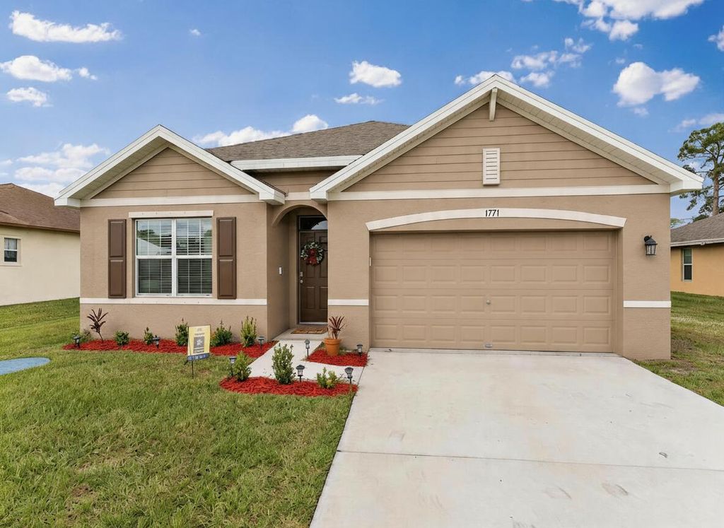 Photo of 1771 SW Lofgren Avenue, Port Saint Lucie, FL 34953 (MLS # B26020436)