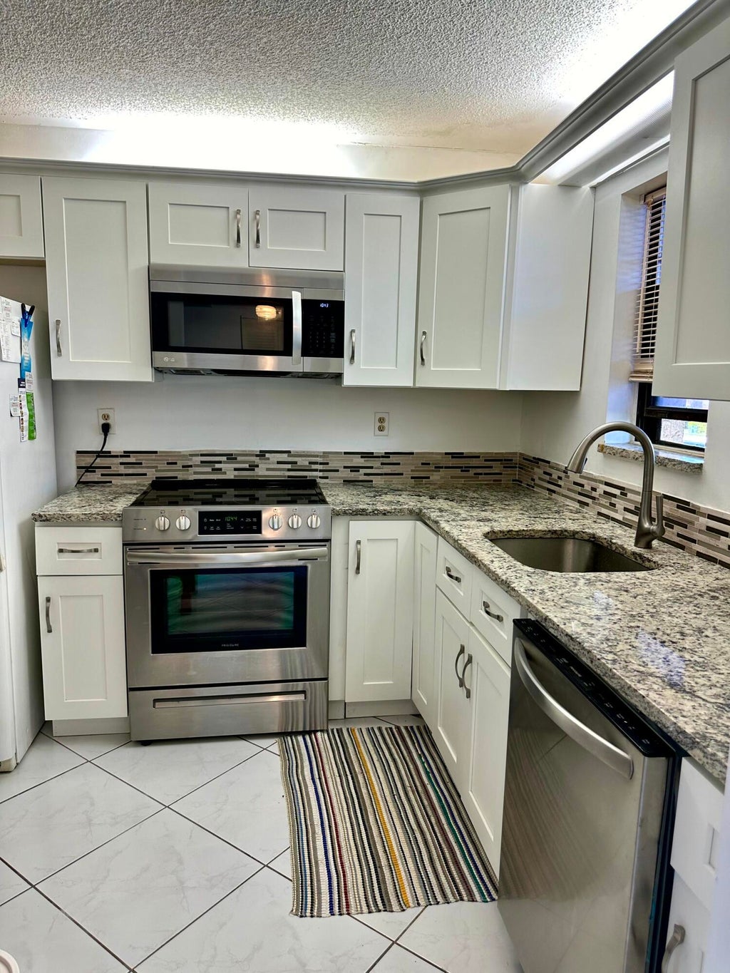 Photo of 9370 SW 8th Street, Boca Raton, FL 33428 (MLS # B26075809)