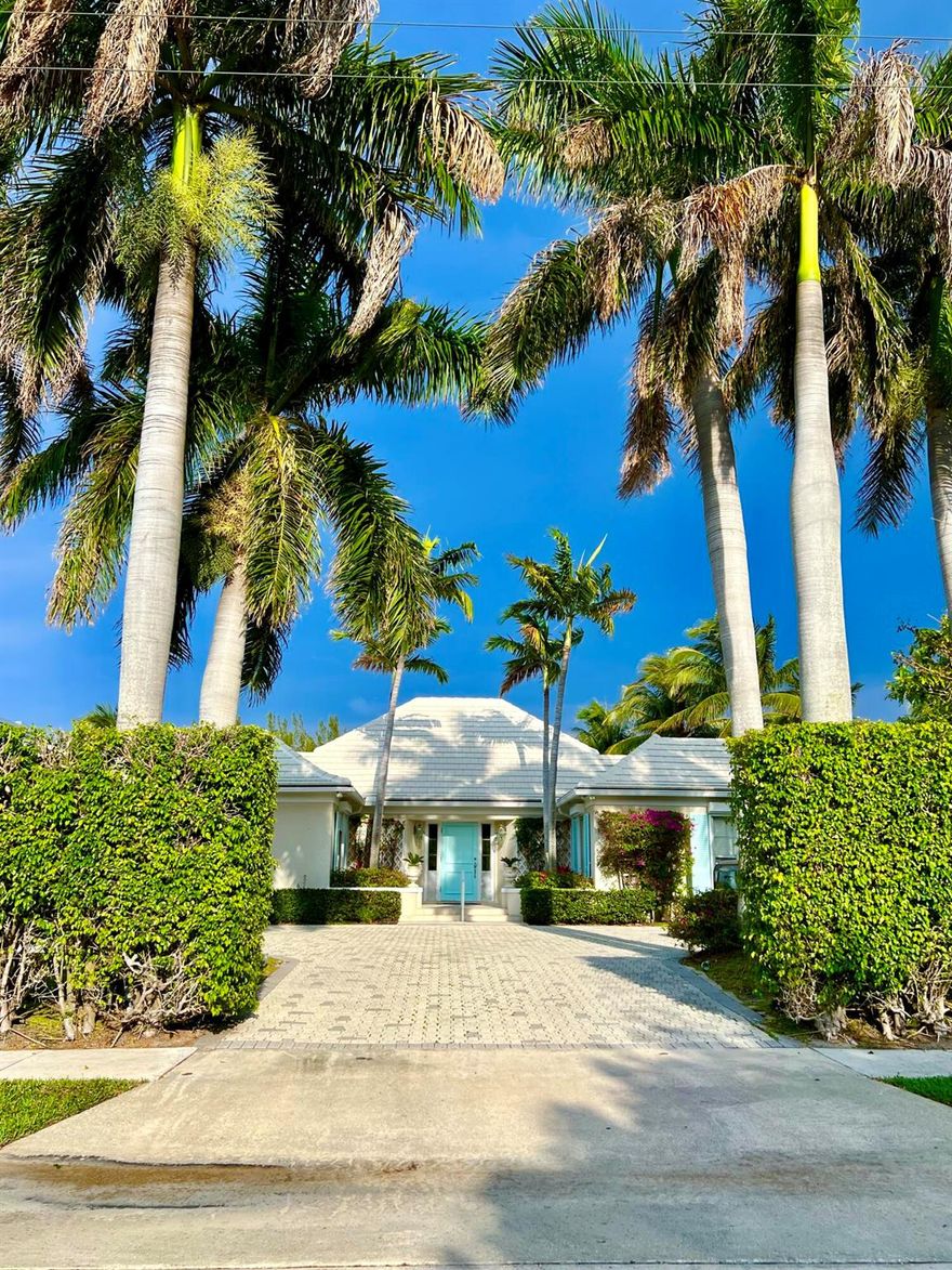 Welcome to 15 Spoonbill Road, an exquisite waterfront property located in the highly sought-after area of Manalapan, FL. Originally built in 1974, this stunning home was designed by the renowned architect Henry Harding and offers a unique blend of traditional and classic style. This impressive property features 3 bedrooms and 3 bathrooms, providing ample space for a family or guests. The interior boasts high ceilings and large windows that allow natural light to flood the space, creating a warm and inviting atmosphere. One of the most striking features of this home is its 112 feet of deep water frontage, private pool, and private dock.