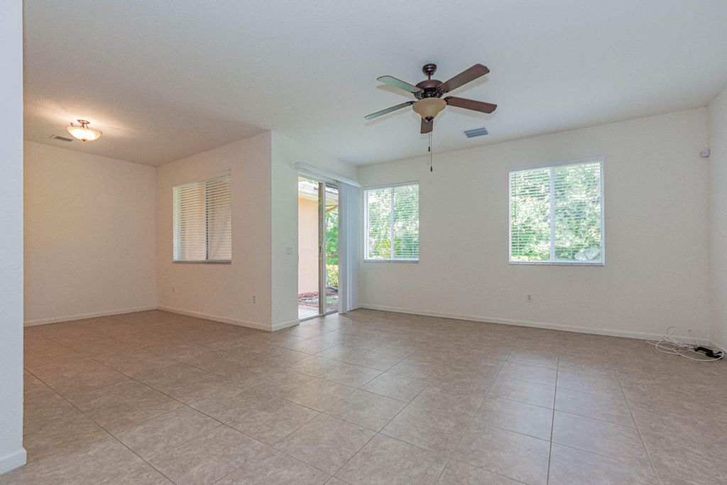 Photo of 2563 SW Stockbridge Sq Square SW, Vero Beach, FL 32962 (MLS # B26037388)