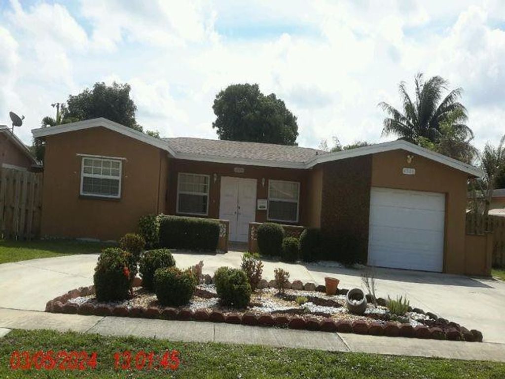 Photo of 4506 NW 39th Street, Lauderdale Lakes, FL 33319 (MLS # F10500812)