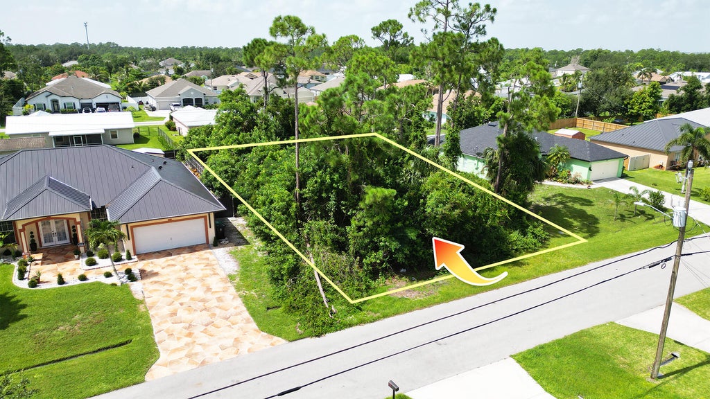 Photo of 1834 SW Penrose Avenue, Port Saint Lucie, FL 34953 (MLS # R11110844)