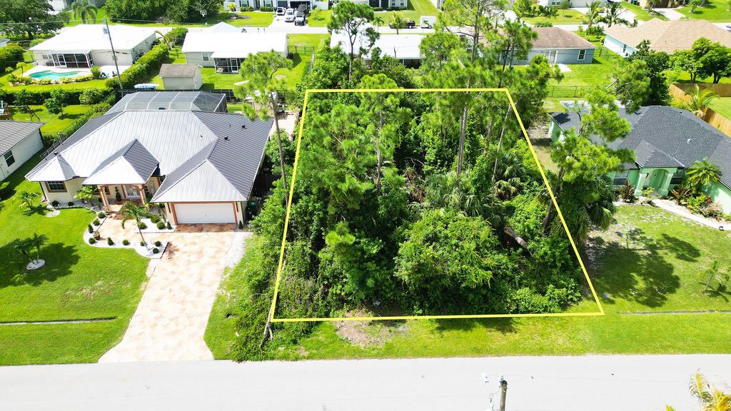 Photo of 1834 SW Penrose Avenue, Port Saint Lucie, FL 34953 (MLS # R11110844)