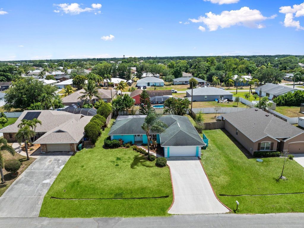 Photo of 130 SW Airview Avenue, Port Saint Lucie, FL 34984 (MLS # R11086973)