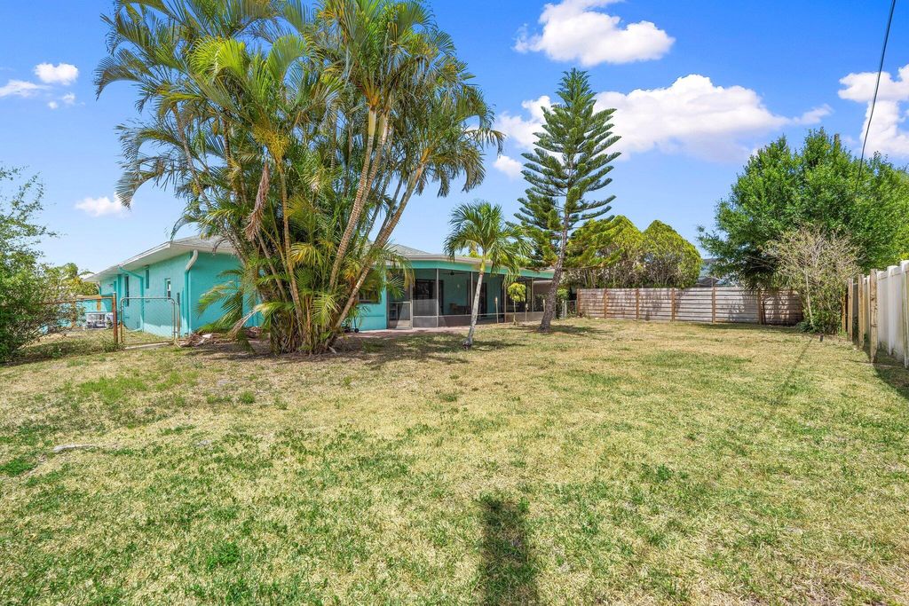 Photo of 130 SW Airview Avenue, Port Saint Lucie, FL 34984 (MLS # R11086973)