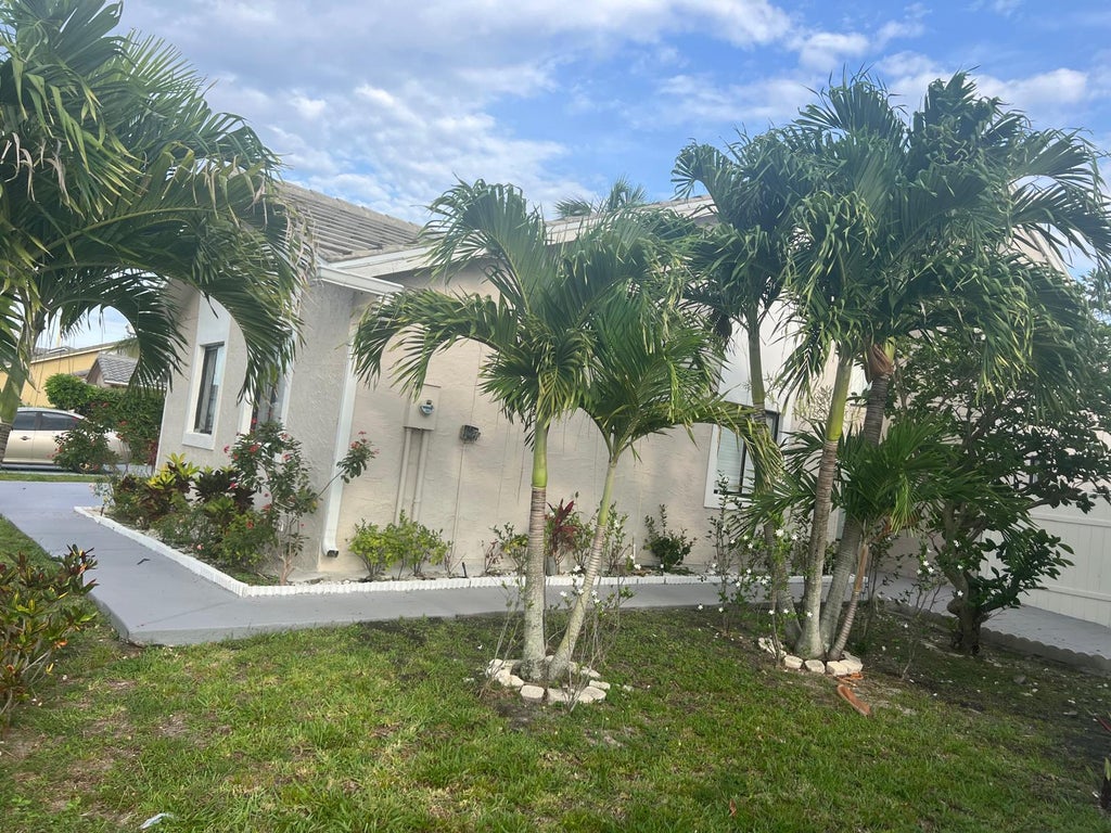 Photo of 5765 Strawberry Lakes Circle, Lake Worth, FL 33463 (MLS # B26036092)