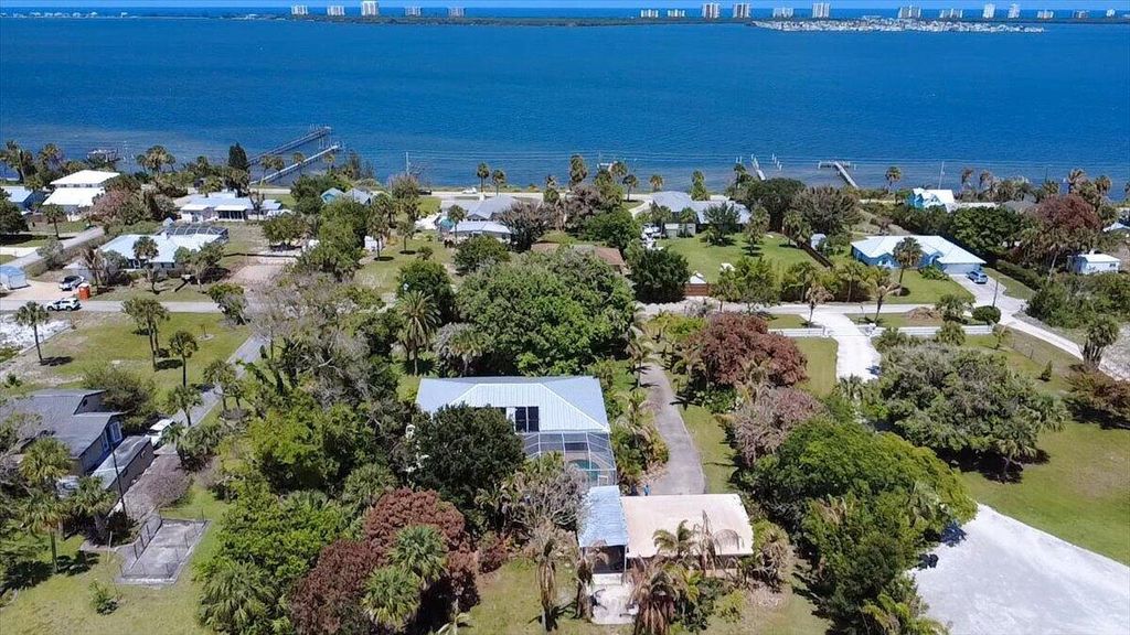 Photo of 105 Sheridan Lane, Jensen Beach, FL 34957 (MLS # B26038333)