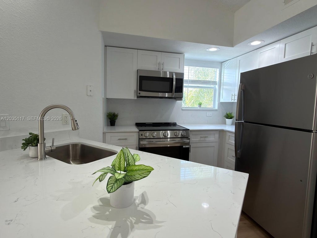 Photo of 12840 Vista Isles Drive #627, Sunrise, FL 33325 (MLS # A12035117)