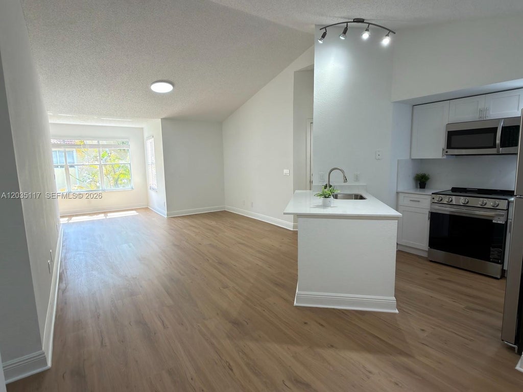 Photo of 12840 Vista Isles Drive #627, Sunrise, FL 33325 (MLS # A12035117)
