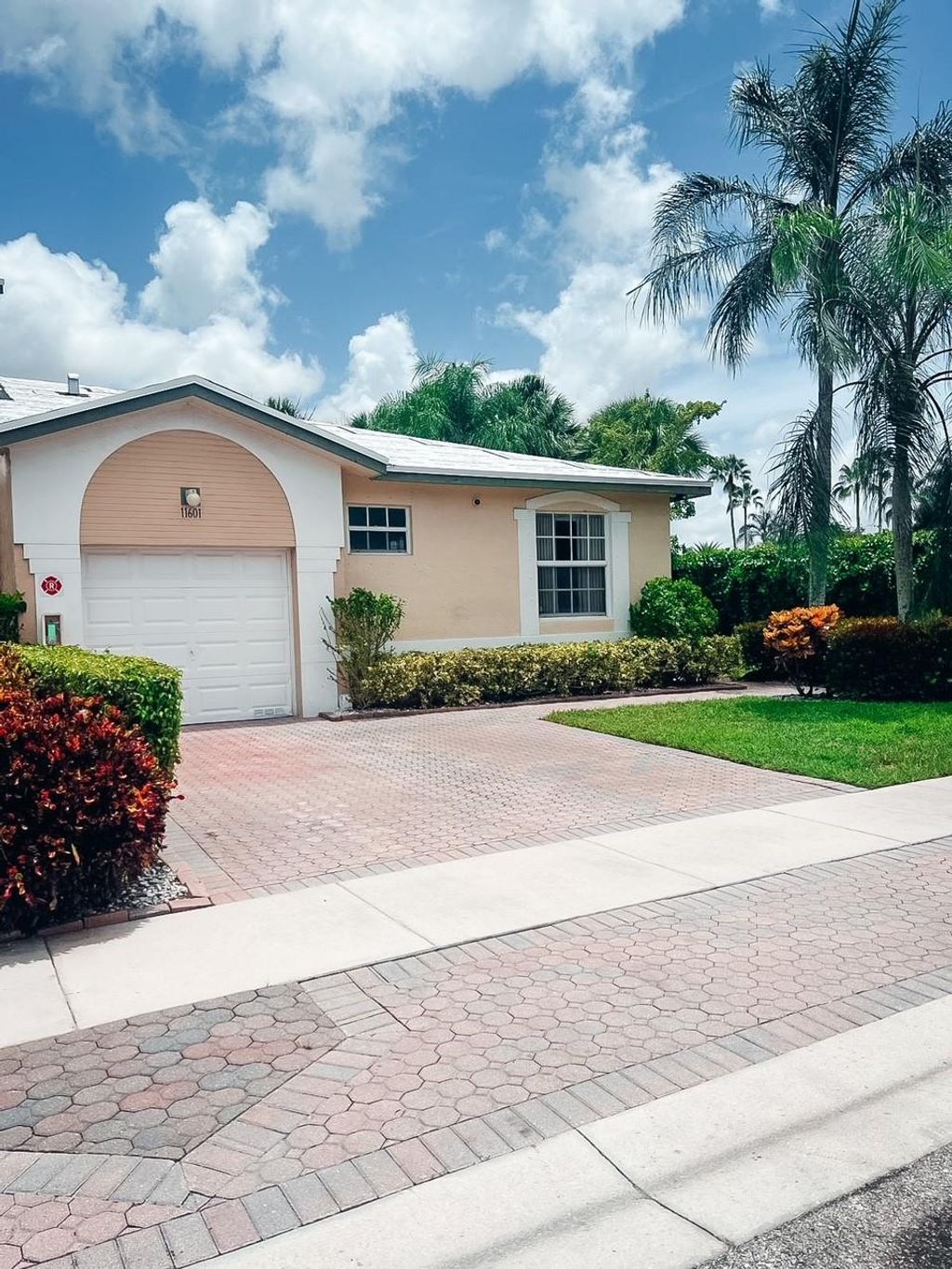 Photo of 11601 NW 47th Drive, Coral Springs, FL 33076 (MLS # F10451124)