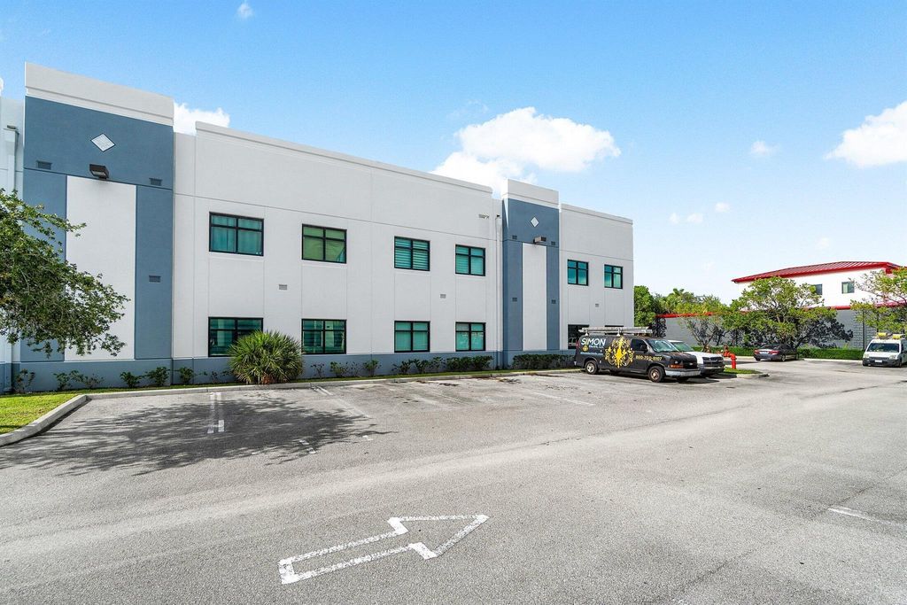 Photo of 9100 Belvedere Road #102, Royal Palm Beach, FL (MLS # R11108602)