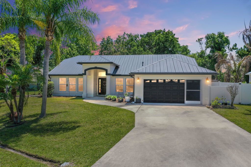 Photo of 5766 NW Jigsaw Lane, Port Saint Lucie, FL 34986 (MLS # B26010031)