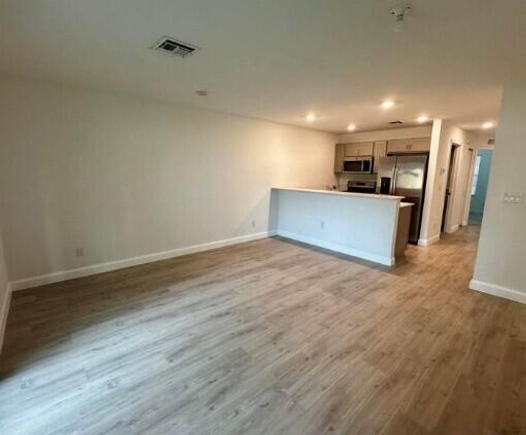 Photo of 4208 Napoli Lake Drive, Riviera Beach, FL 33410 (MLS # B26006650)