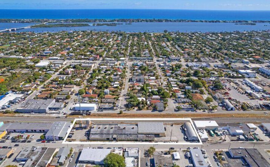 This unique opportunity doesn't occur often. Don't miss out on this very rare & important property being offered for sale on the market. Approximately 1.243 Acre, totaling 54,145 sq ft, making it the largest parcel located on the highly sought after Georgia Avenue corridor, within the heartbeat of the local community, attracting designers, contractors, antique shops, restaurants... The main building has over 27,700 sq ft & features a large reception area, conference rm, 9 offices, & warehouse w/4 roll up garage doors plus 1 barn door, and a quonset hut on the south side with over 3,800 sq ft., 1 roll up garage door, w/plenty of parking. Being sold with or without over 2 dozen wood working machines to create high end custom doors, mouldings, cabinets and so much more.