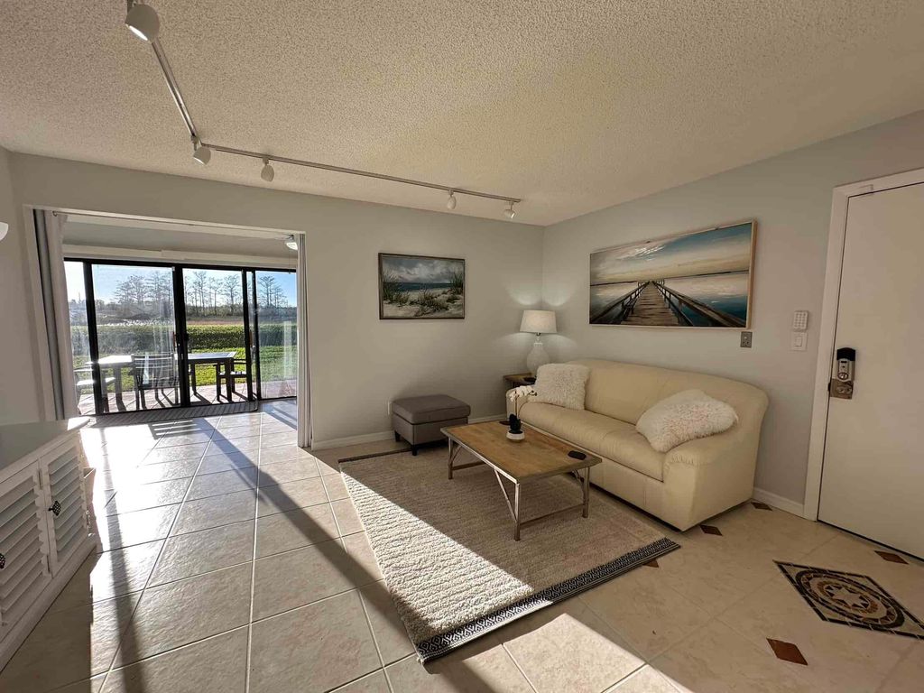 Photo of 1111 Duncan Circle #102, Palm Beach Gardens, FL 33418 (MLS # R10961819)