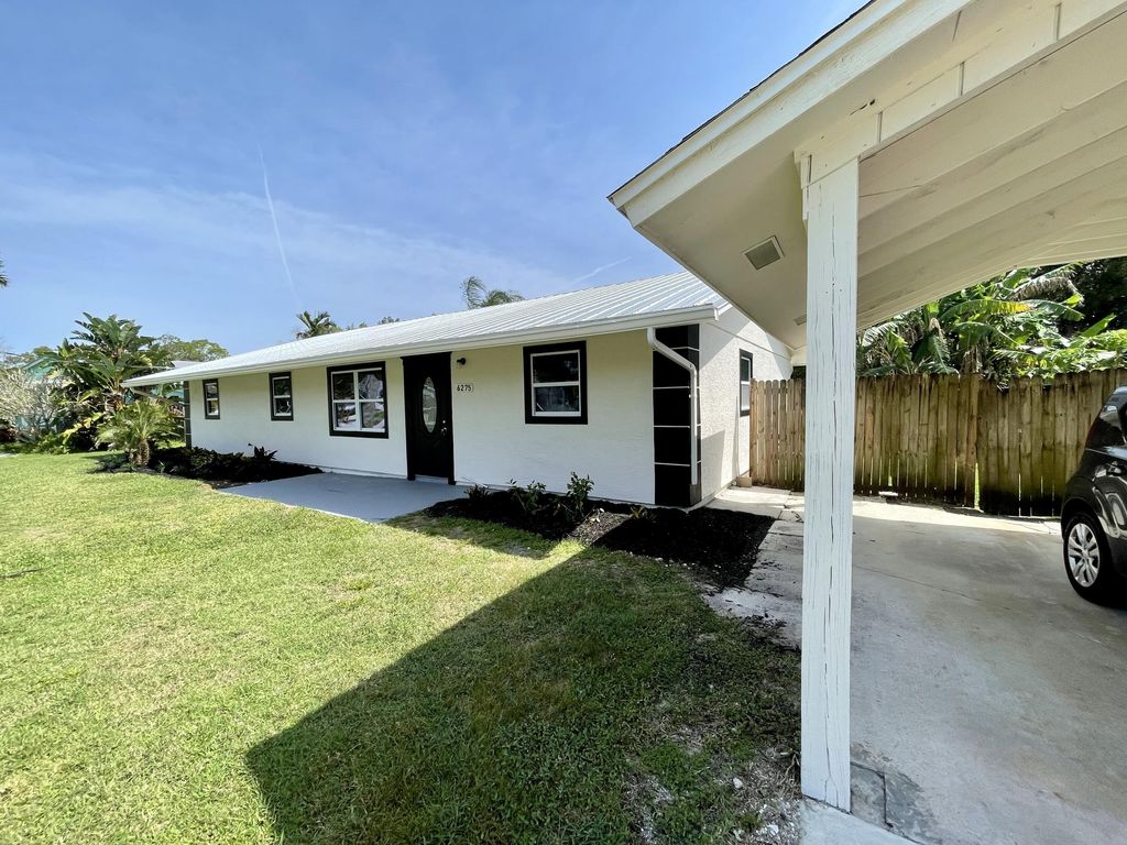 Photo of 6275 SE Thomas Drive, Stuart, FL 34997 (MLS # R10790496)