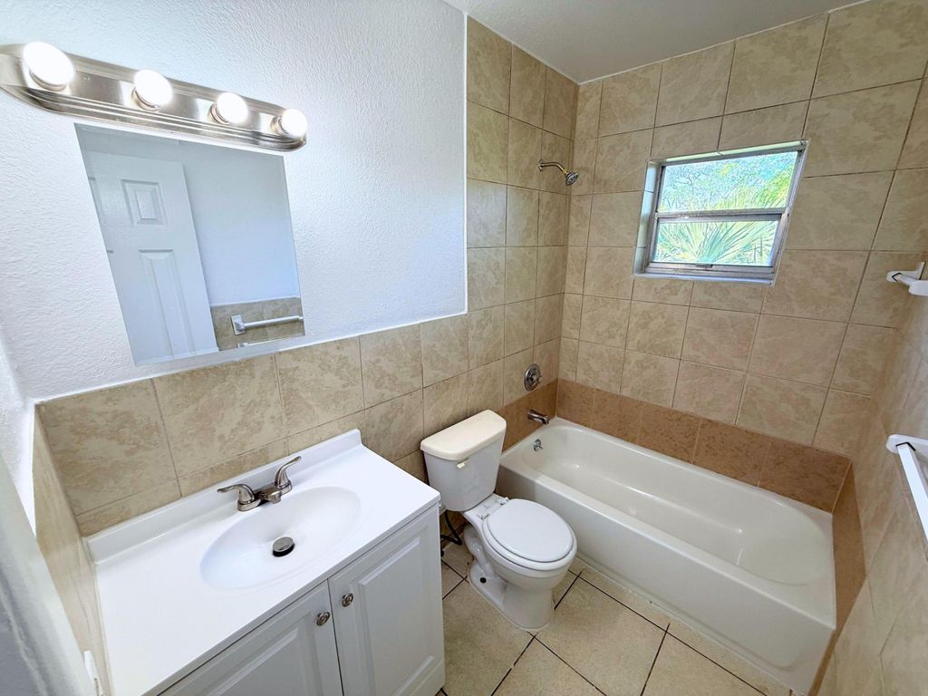 Photo of 432 NW 42nd Street #1-6, Oakland Park, FL 33309 (MLS # B26043958)