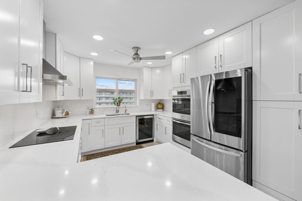 Photo of 1040 CRYSTAL LAKE Drive #4, Deerfield Beach, FL 33064 (MLS # B26061348)