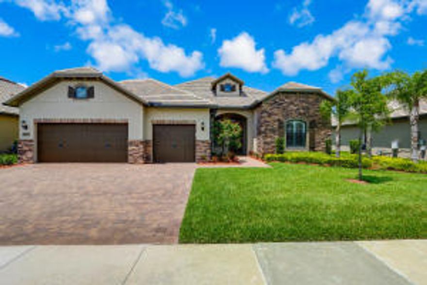 A little over 1 year old, this gorgeous DiVosta home is Priced to sell!! It sits on just under 1/4 acre with amazing lake views! This home features 3 bedrooms 3 full bathrooms with a full 3 car garage. Walking into this home is like stepping into paradise. Notice the one of a kind Restoration Hardware chandelier as you walk into the foyer. The kitchen features crystal pendent lighting over the breakfast bar, tray ceilings everywhere, and all the upgrades you can imagine. This airy open floor plan allows you enjoy your lake views from almost any standpoint. This home is on a prime lot within walking distance of the club house and all of its amenities in Castellina, a gated community in the heart of Wellington, South Florida's Equestrian capital.