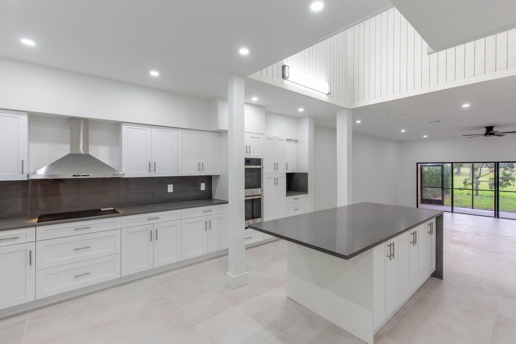 Photo of 1989 Canterbury Circle, Wellington, FL 33414 (MLS # R11159453)