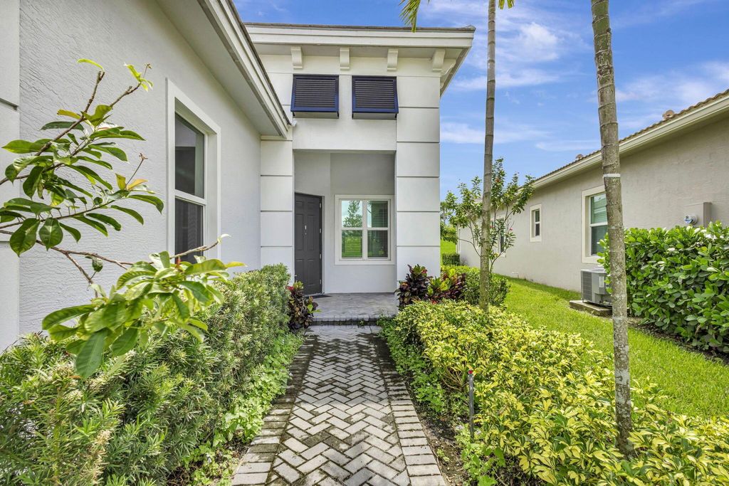 Photo of 9225 SW Pepoli Way, Port Saint Lucie, FL 34987 (MLS # R11122652)