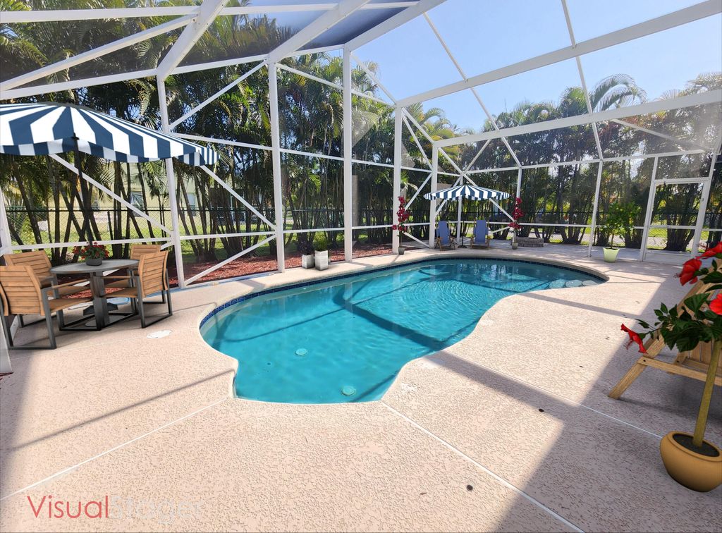 Photo of 2464 SW Omega Way, Stuart, FL 34997 (MLS # R10811018)