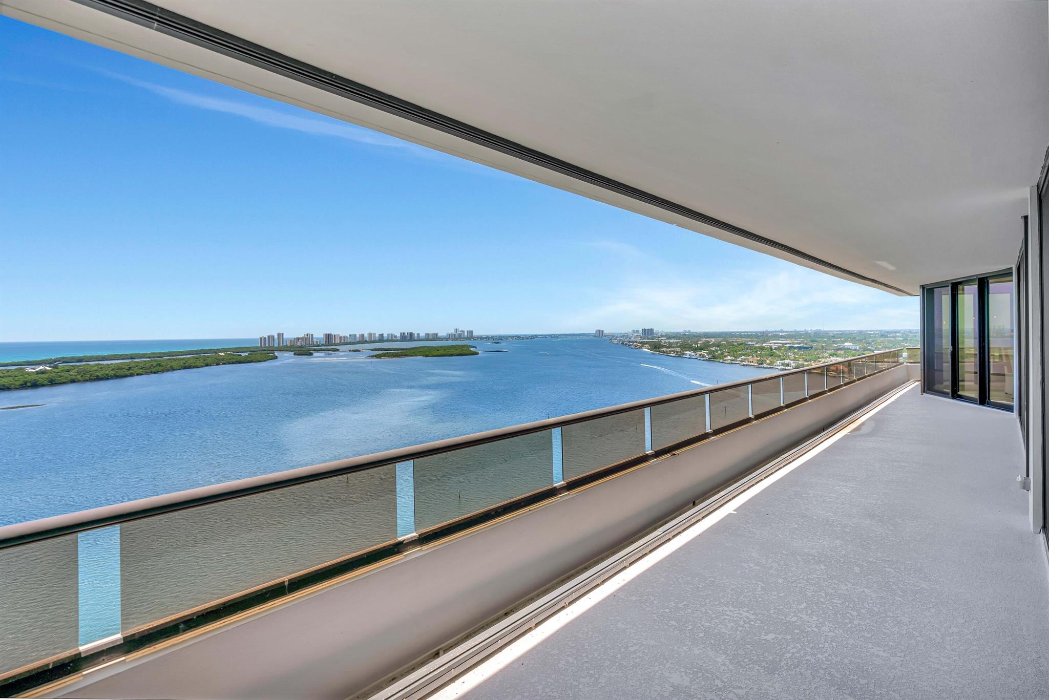 Fully Renovated Coastal Masterpiece!Discover unparalleled luxury at this completely renovated 3-bedroom, 3.5-bathroom residence at Lake Point Tower, one of Palm Beach County's most prestigious addresses. Spanning 2,865 living square feet, this stunning condo has been taken down to the studs and been meticulously rebuilt. Beautiful wood floors and breathtaking floor-to-ceiling complete impact windows that showcase panoramic views of the Intracoastal Waterway, John D. MacArthur Park, the Atlantic, and long southeastern vistas of the Intracoastal. Every room is bathed in natural light, creating a seamless connection to the mesmerizing waterfront.