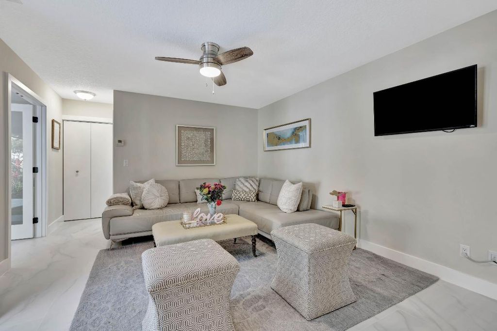Photo of 356 Prestwick Circle #3, Palm Beach Gardens, FL 33418 (MLS # R11091569)