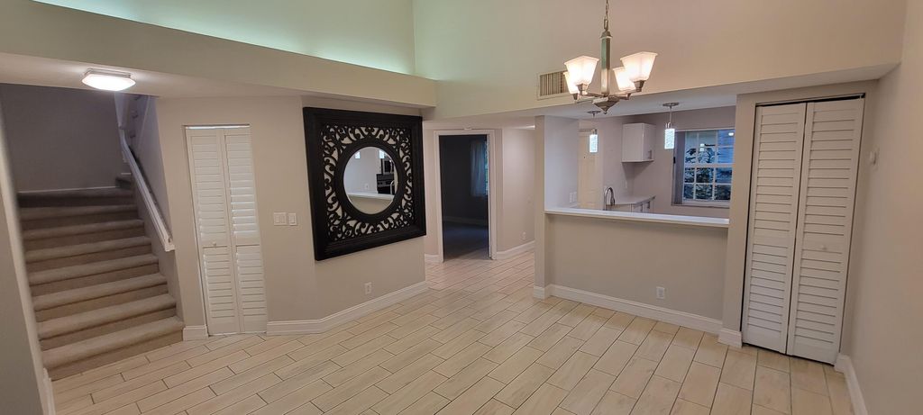 Photo of 1125 Lake Shore Drive #202, Lake Park, FL 33403 (MLS # B26011795)