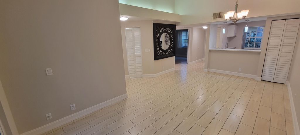 Photo of 1125 Lake Shore Drive #202, Lake Park, FL 33403 (MLS # B26011795)