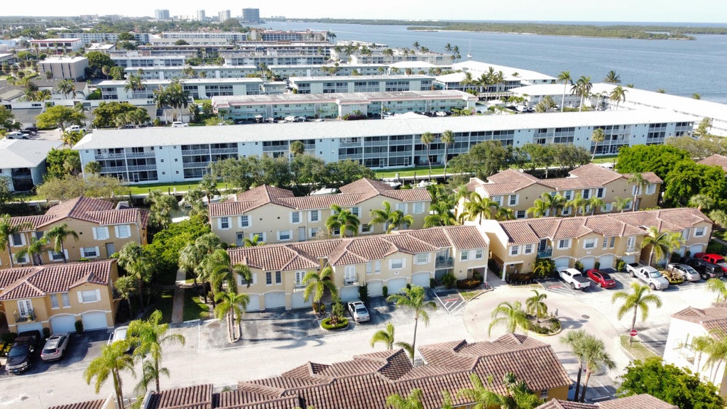Photo of 1125 Lake Shore Drive #202, Lake Park, FL 33403 (MLS # B26011795)