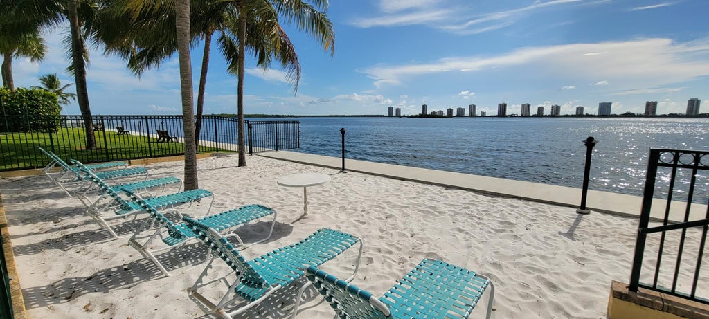 Photo of 1125 Lake Shore Drive #202, Lake Park, FL 33403 (MLS # B26011795)