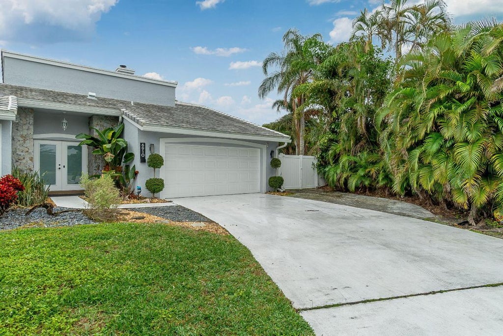 Photo of 6910 NW 2nd Terrace, Boca Raton, FL 33487 (MLS # R10954698)
