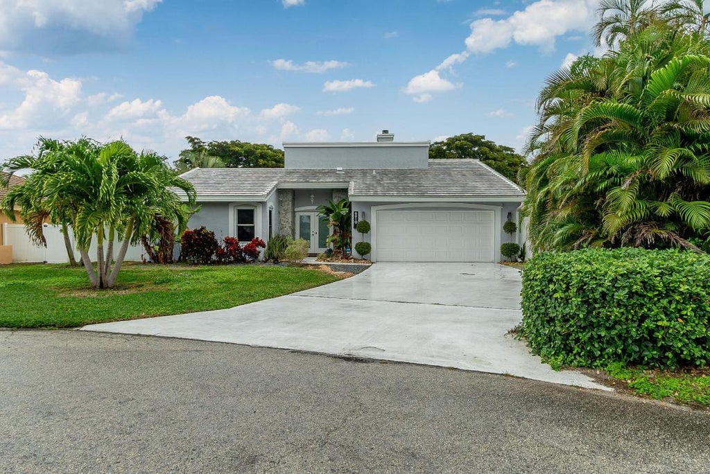 Photo of 6910 NW 2nd Terrace, Boca Raton, FL 33487 (MLS # R10954698)