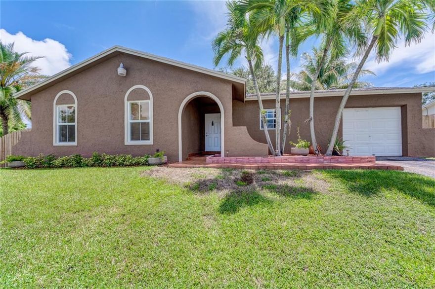 Spacious corner lot home with privacy fence.  Side entrance gate allows for boat or RV parking.  No HOA community.  3/2 with one car garage is fully equipped with thick high end hurricane impact windows.  Eat in Kitchen with top of the line brand new appliances! Brand new water heater with built in fan AC.   Light and bright! High ceilings. Plenty of room for a pool! Bathrooms are updated.  This home is one of a kind