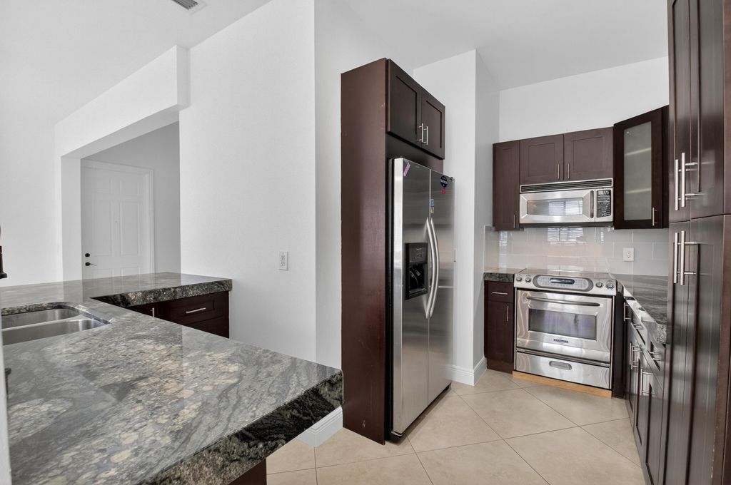 Photo of 2515 Venetian Court, Boynton Beach, FL 33426 (MLS # B26002080)