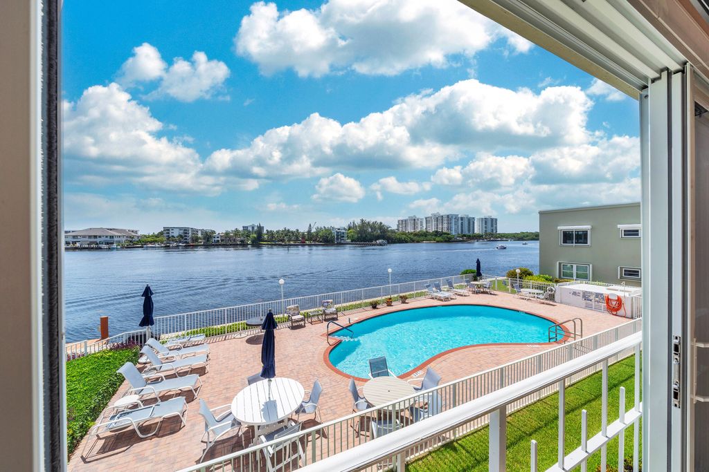 Photo of 711 NE Harbour Terrace #409, Boca Raton, FL 33431 (MLS # B26051599)