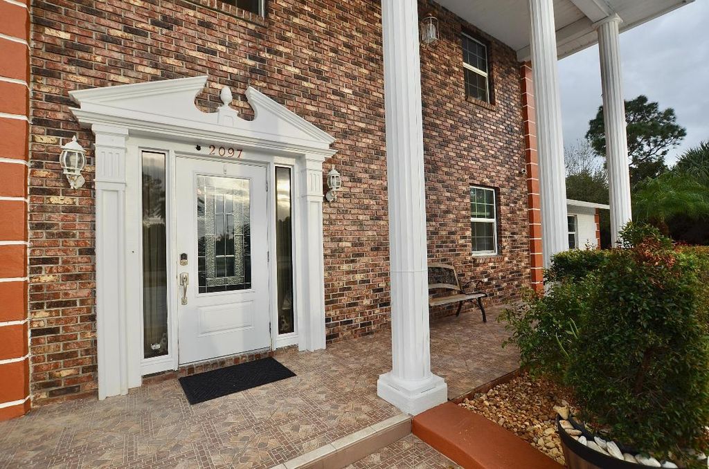 Photo of 2097 SE Morningside Boulevard, Port Saint Lucie, FL 34952 (MLS # R11132399)